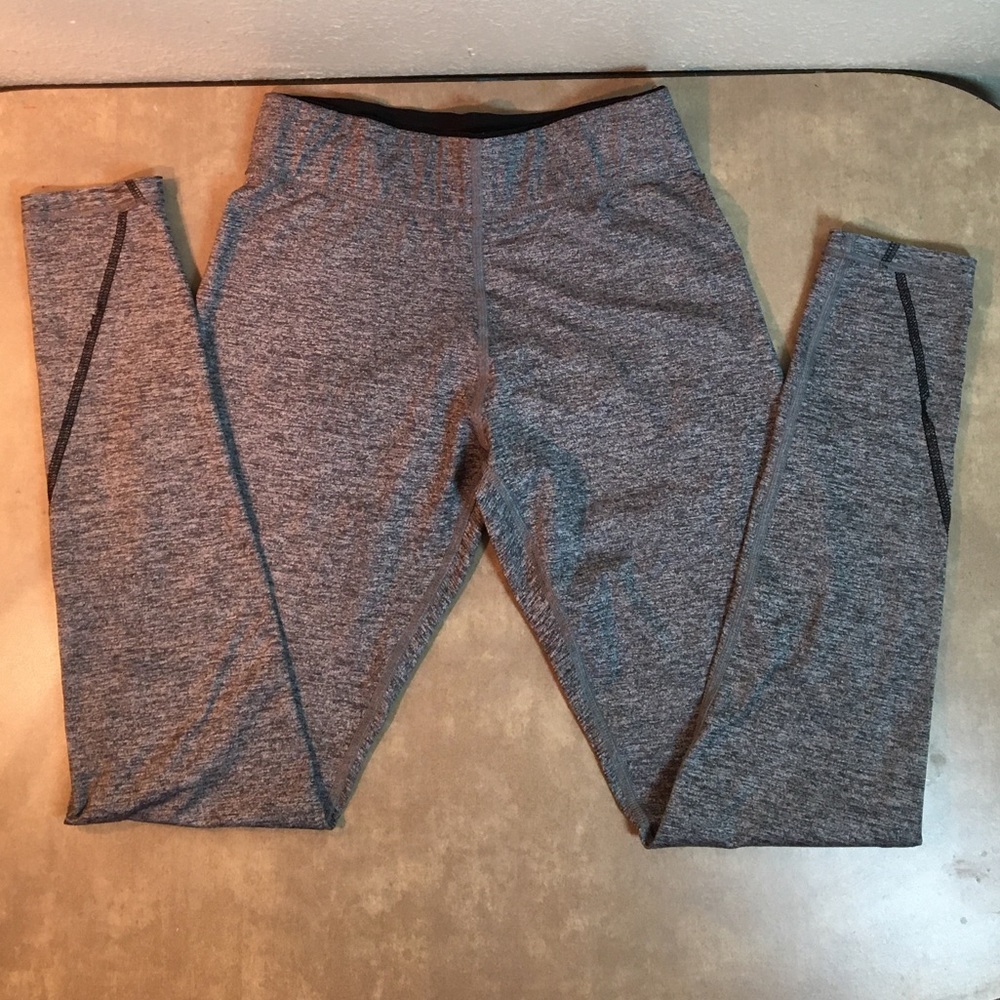Pink Victoria’s Secret dark gray yoga pants.